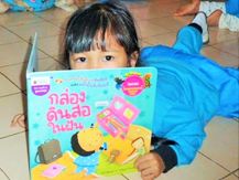 Close Up of child reading book