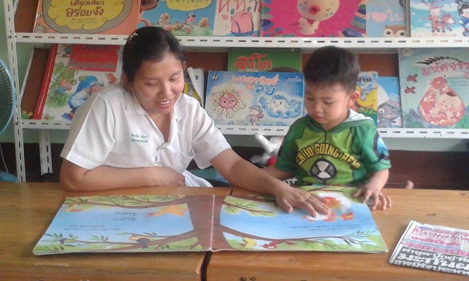 mum and child reading big book