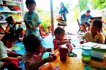 children playing in library